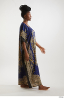 Dina Moses  1 dressed side view traditional decora long african dress whole body 0001.jpg